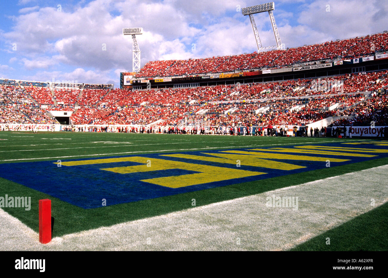 Large colorful crowd at football college game at Gator Bowl in