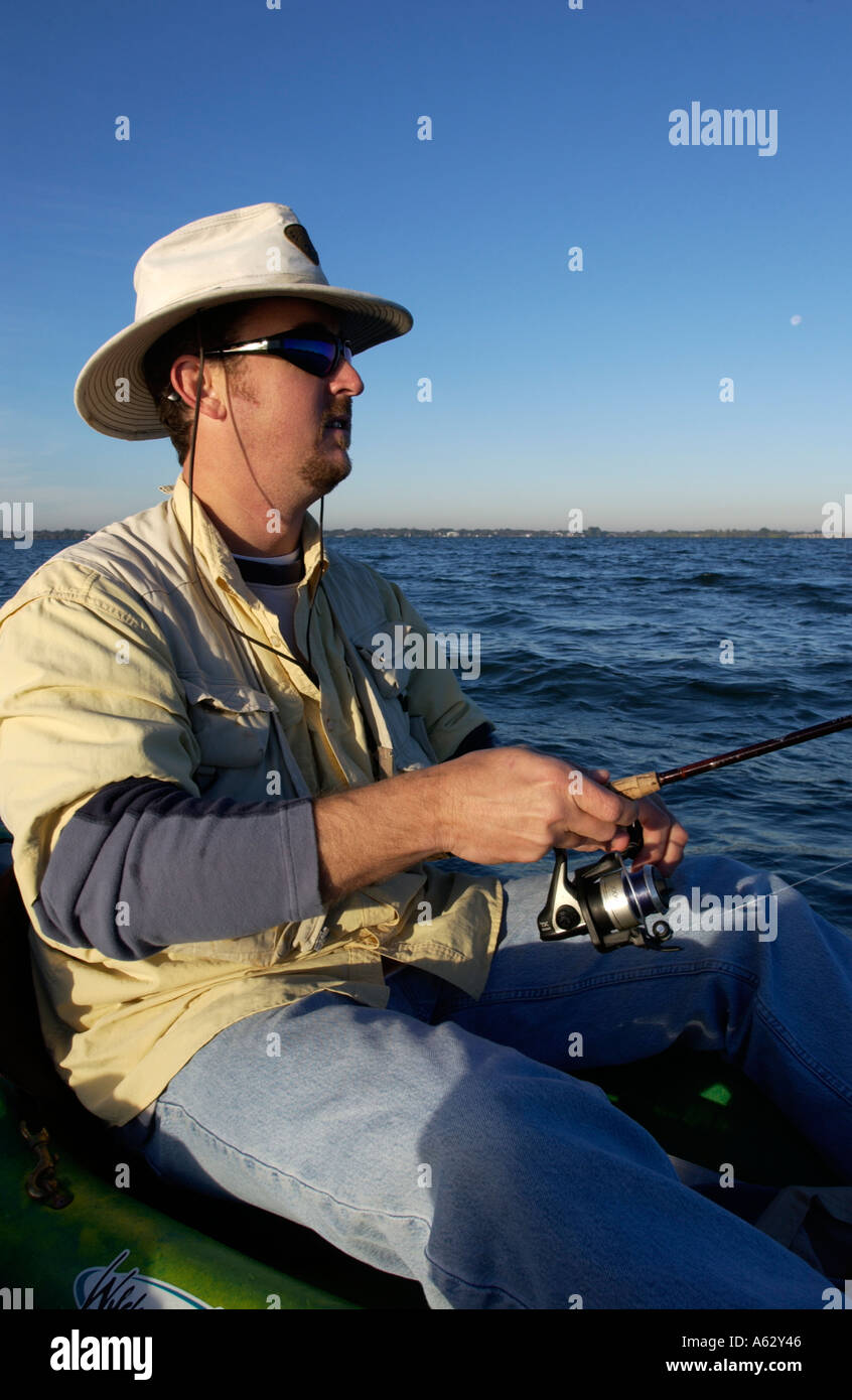Man fishing from kayak Intracoastal waterway Indian River Lagoon Stuart