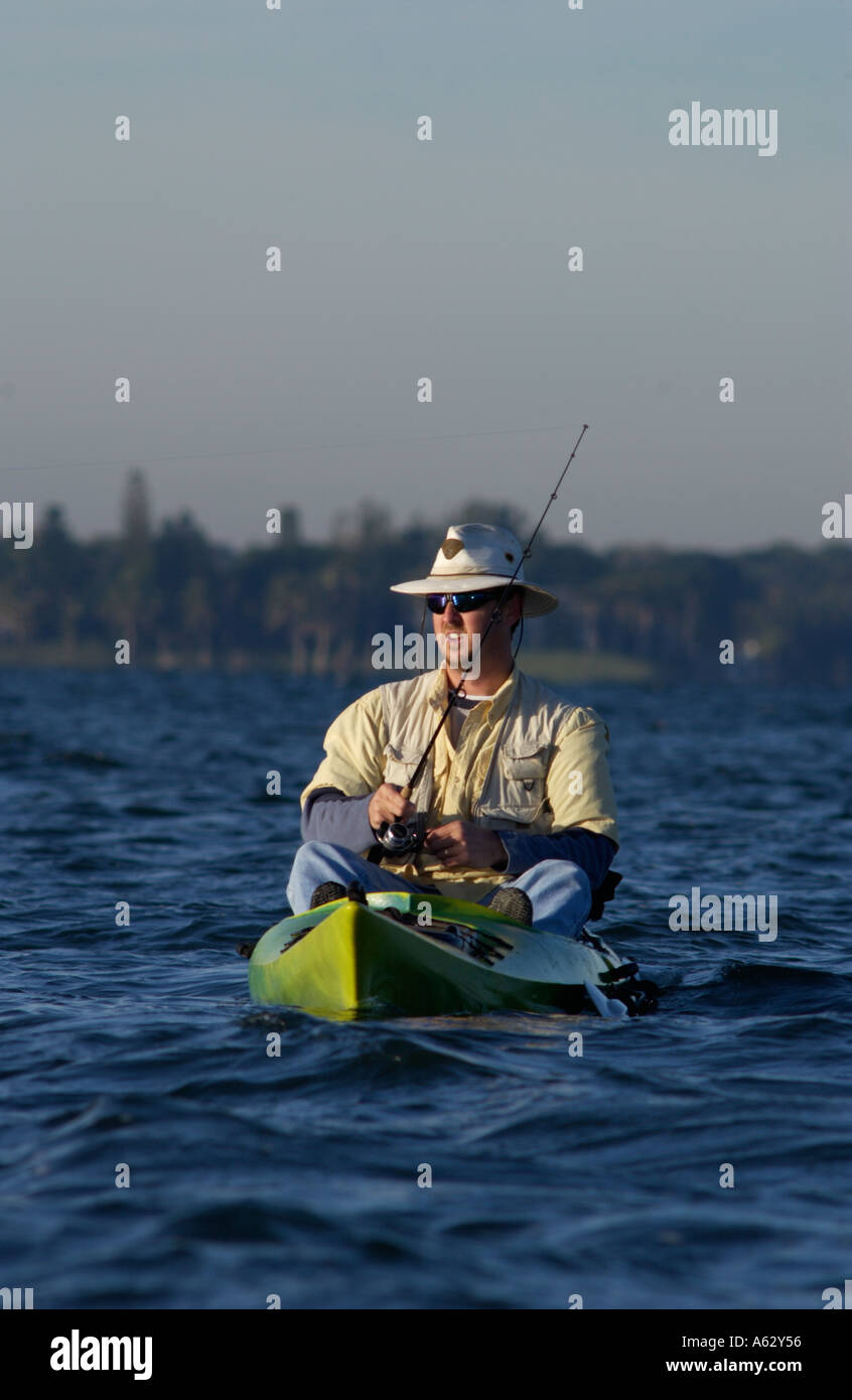 Man fishing from kayak Intracoastal waterway Indian River Lagoon Stuart
