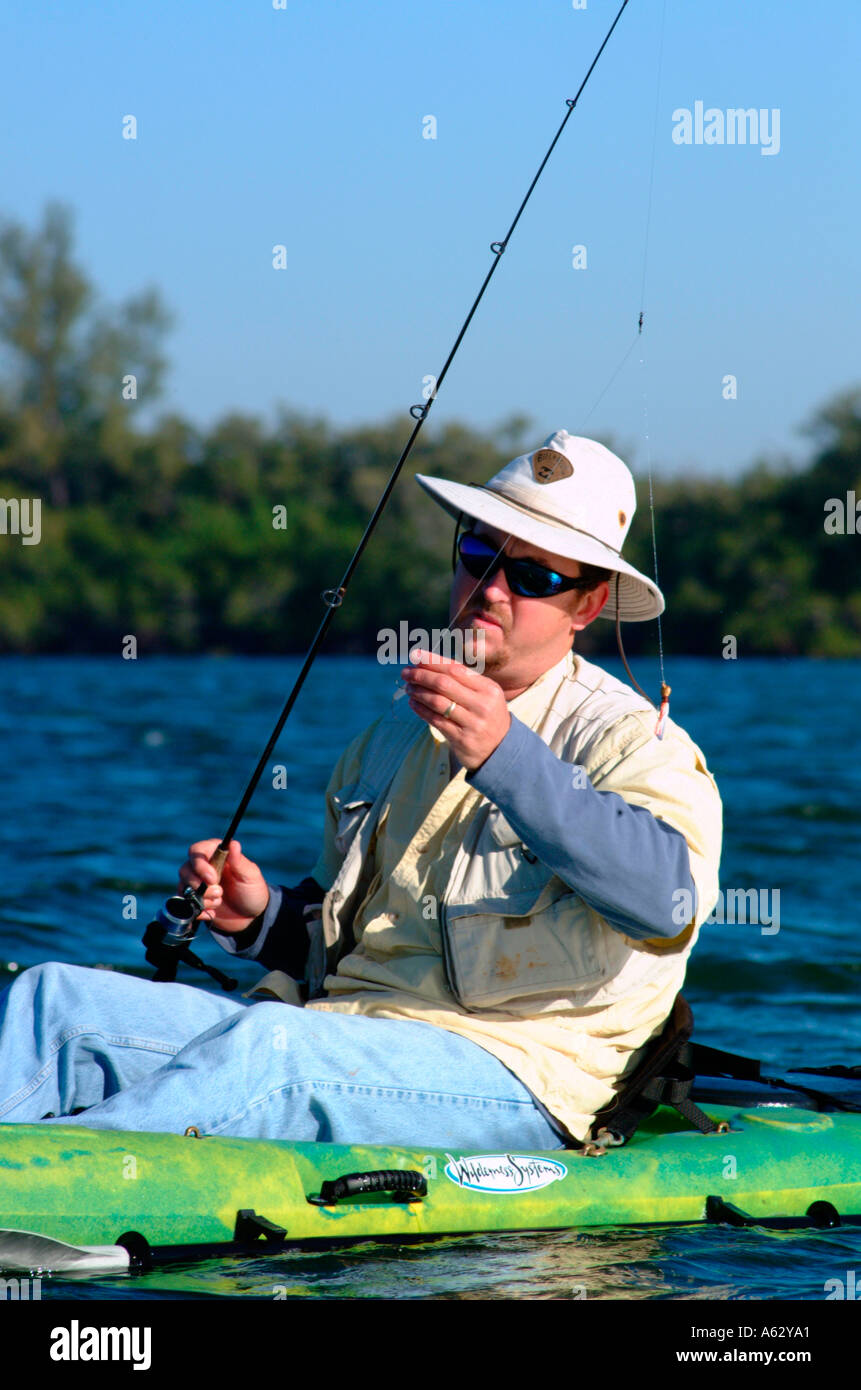 Man fishing from kayak Intracoastal waterway Indian River Lagoon Stuart