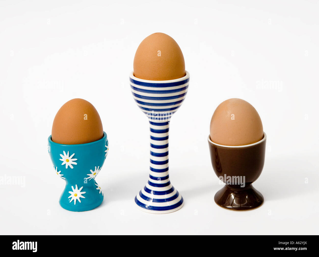 Selection of eggs in Easter egg cups Stock Photo