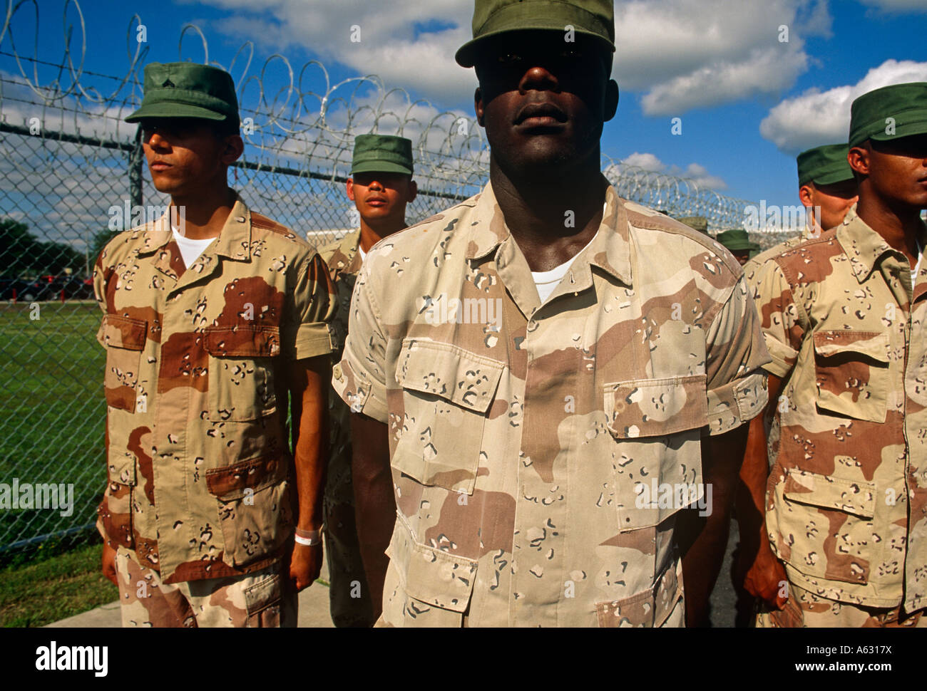 Young prisoners stand to attention on the parade ground, Harris County prison, Houston, Texas Stock Photo