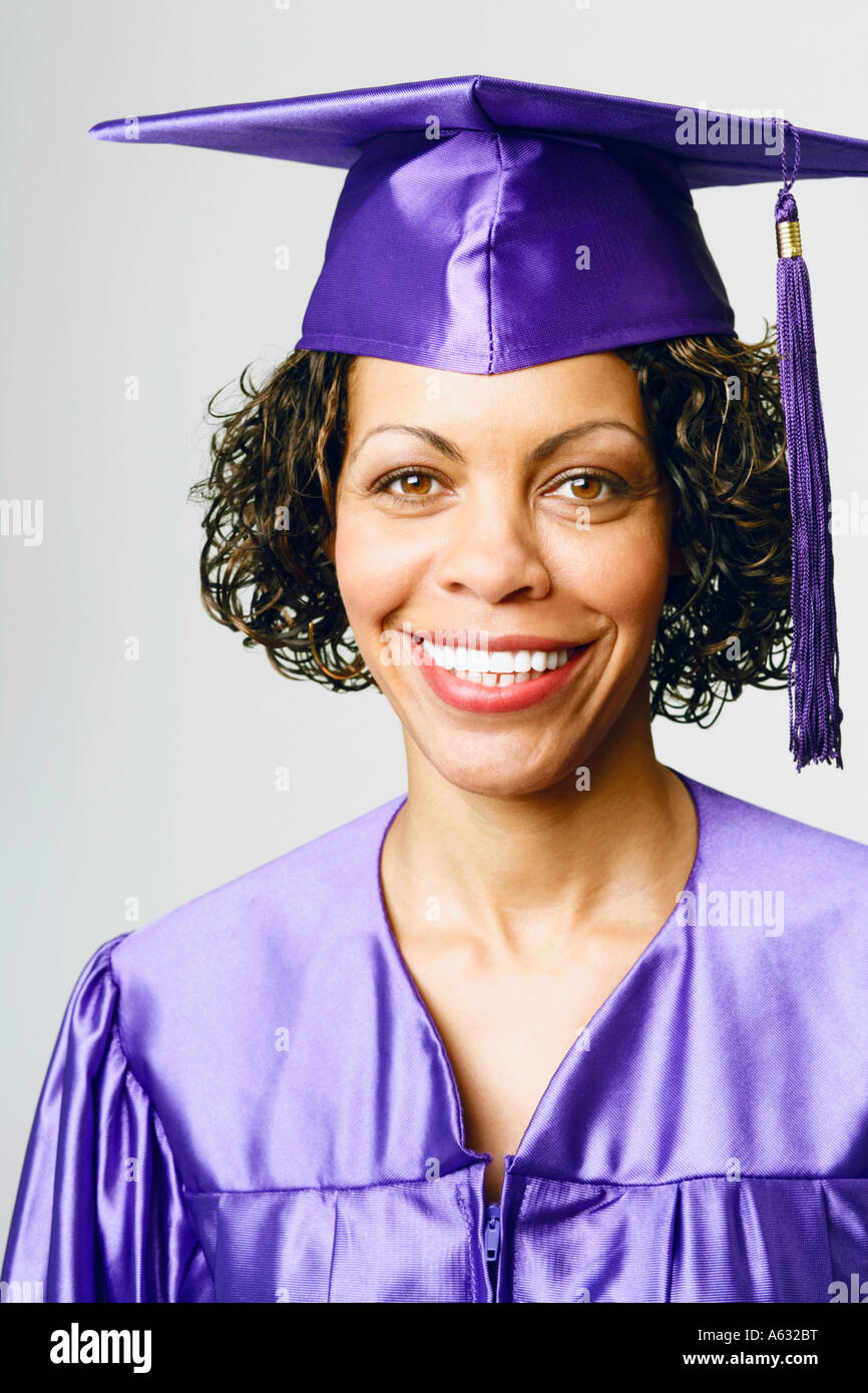 Portrait of a female graduate smiling Stock Photo - Alamy
