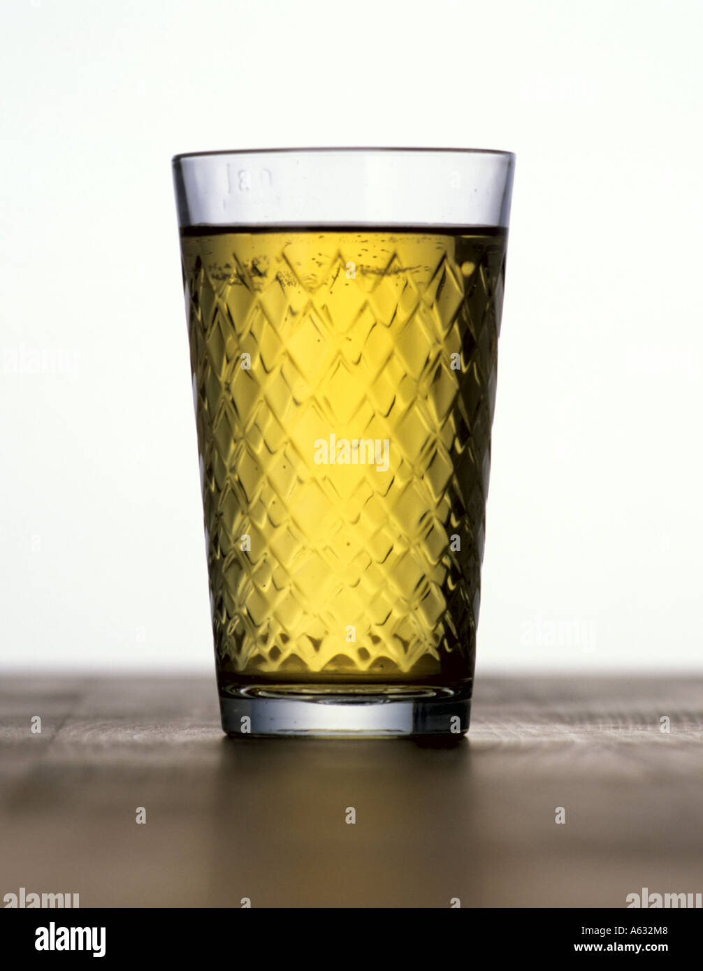 Close-up of glass of apple juice Stock Photo