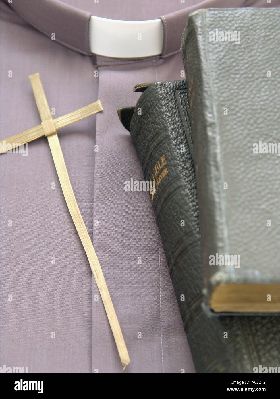 Vicar collar with Bible and cross GB UK 2006 Stock Photo Alamy