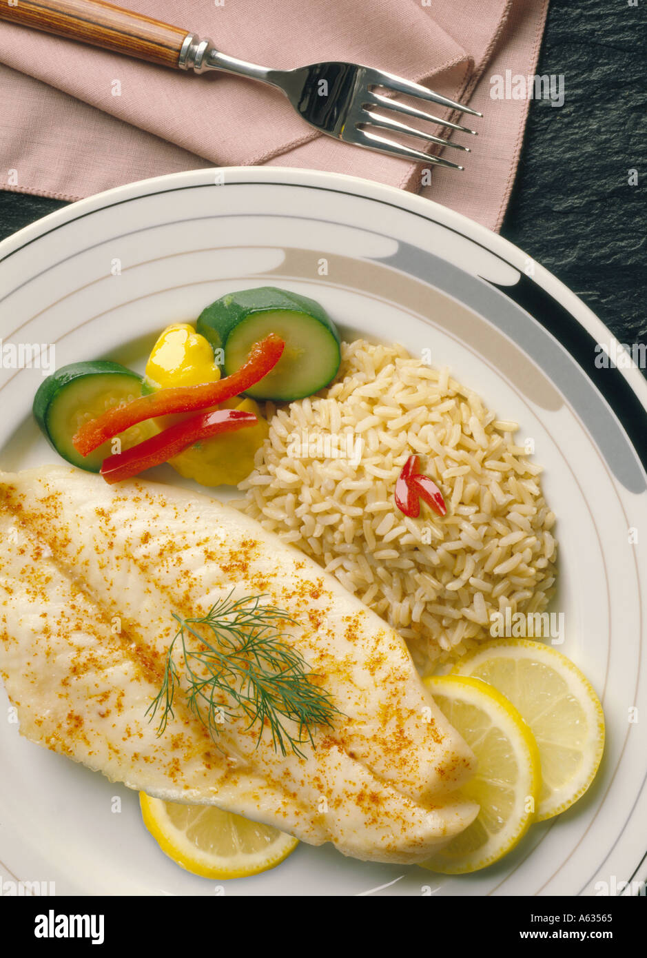 Fish Filet of baked or sauted fish dinner with brown rice and saute of ...