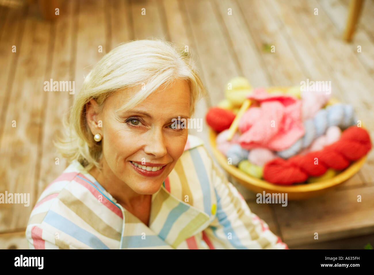 Portrait of a senior woman smiling Stock Photo - Alamy