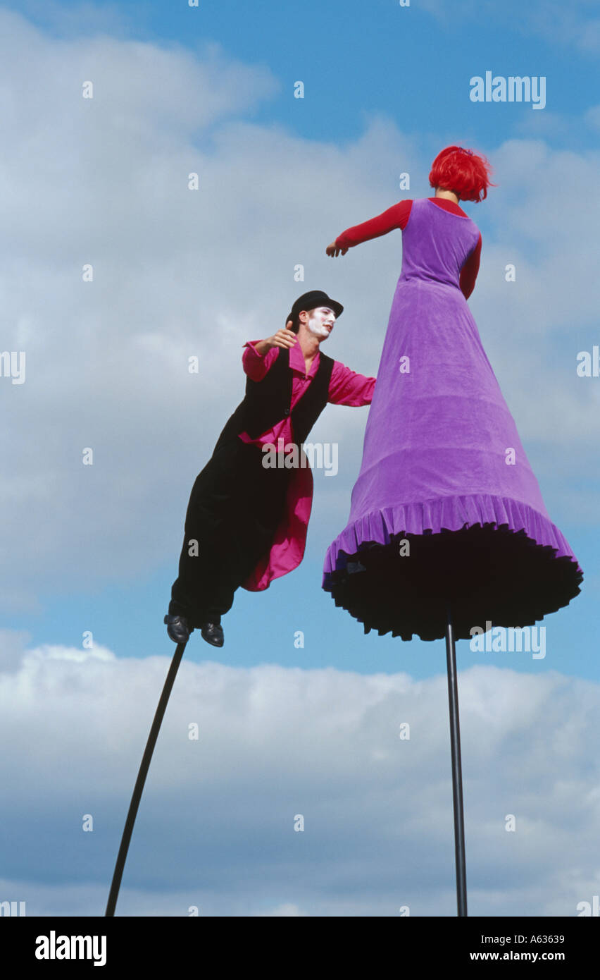 Clowns on the end of poles Stock Photo - Alamy