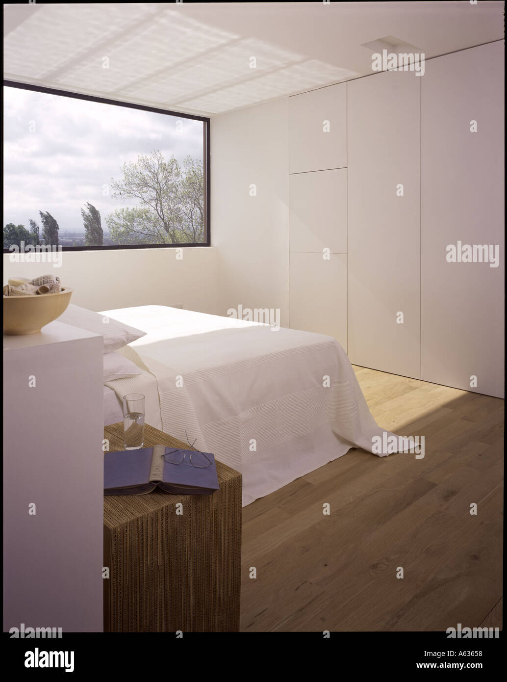 The Tall House Master Bedroom On The Top Floor With White