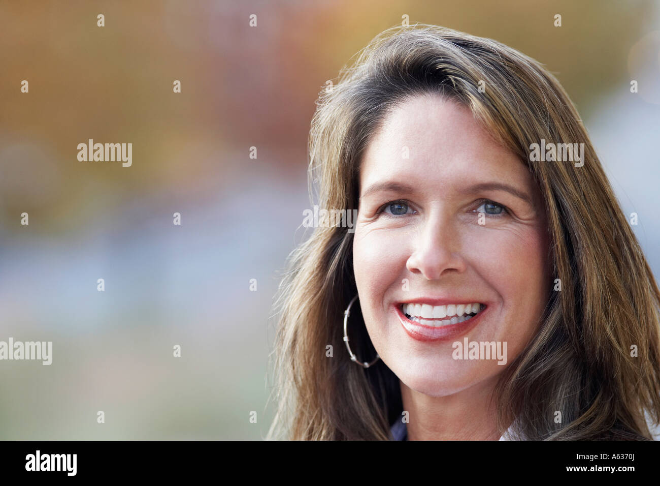 Portrait of a mature woman smiling Stock Photo - Alamy