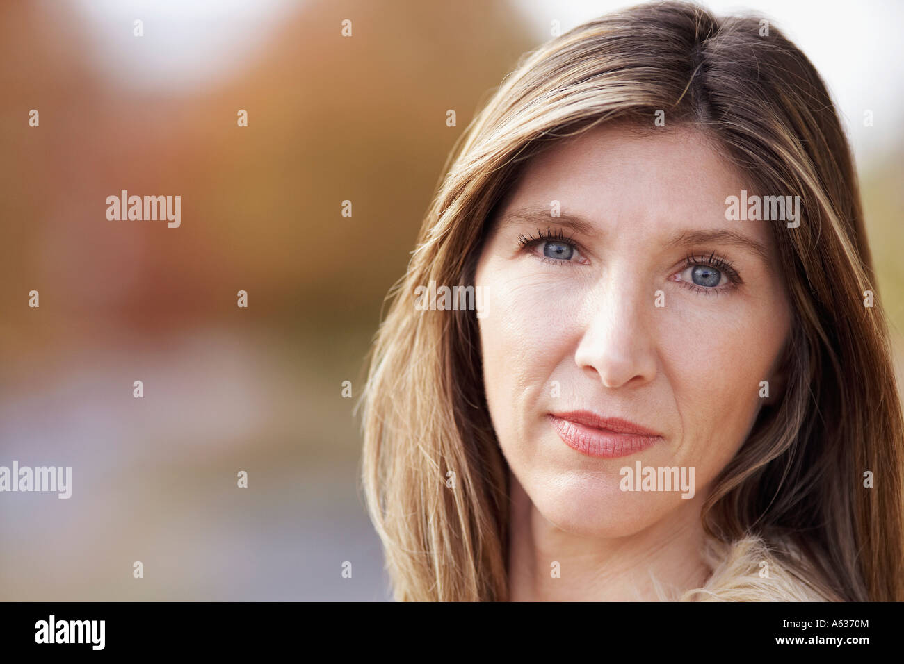 Portrait of a mature woman looking serious Stock Photo - Alamy