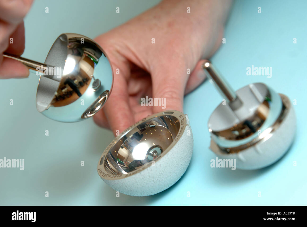 A DEMONSTRATION OF A TITANIUM PLATED HIP REPLACEMENT JOINT UK Stock