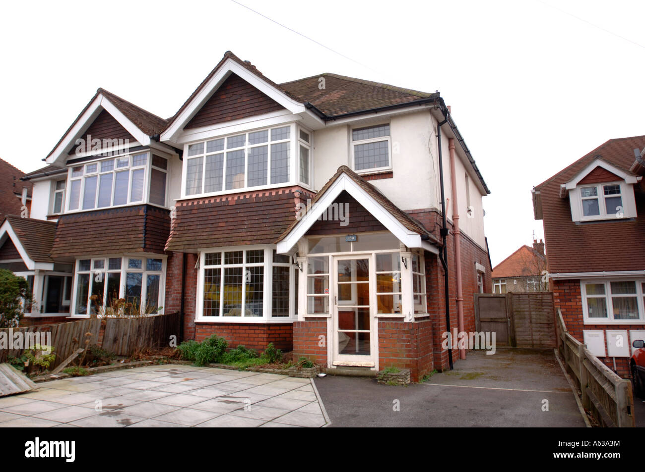 A TYPICAL SEMI DETACHED HOUSE IN A SUBURBAN STREET UK Stock Photo