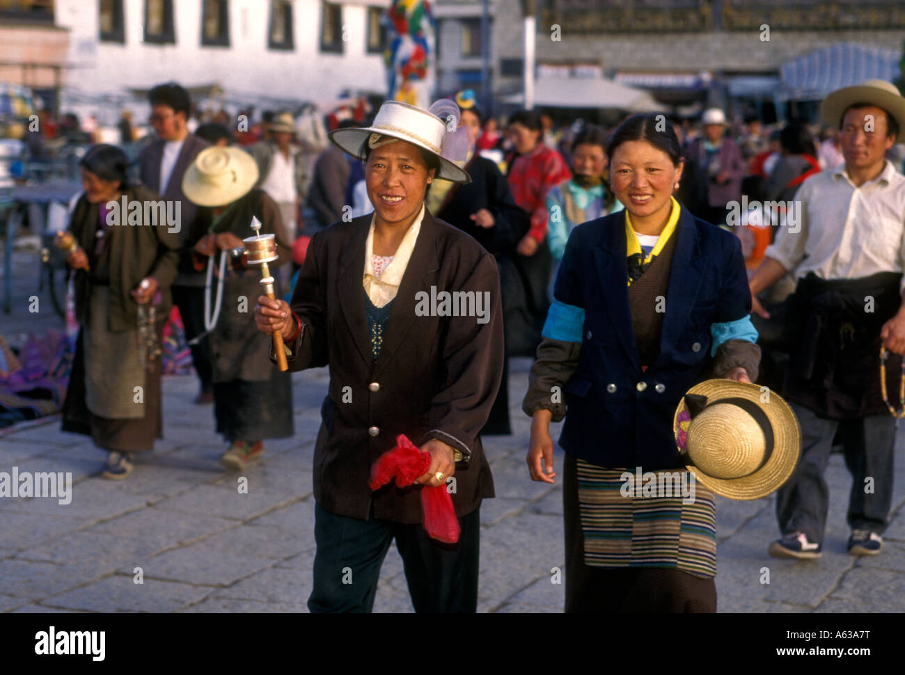 Tibetan women, pilgrims, circumambulate, circumambulation route, Jokhang Temple, Buddhist temple, Barkhor Square, Lhasa, Tibet, China, Asia Stock Photo