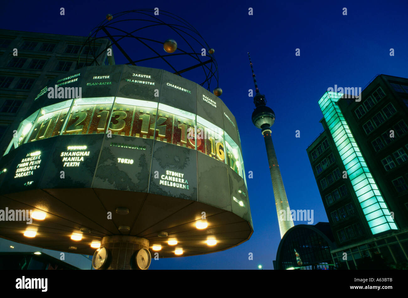 Low angle view of time zone clock, Alexanderplatz, Berlin, Germany Stock Photo
