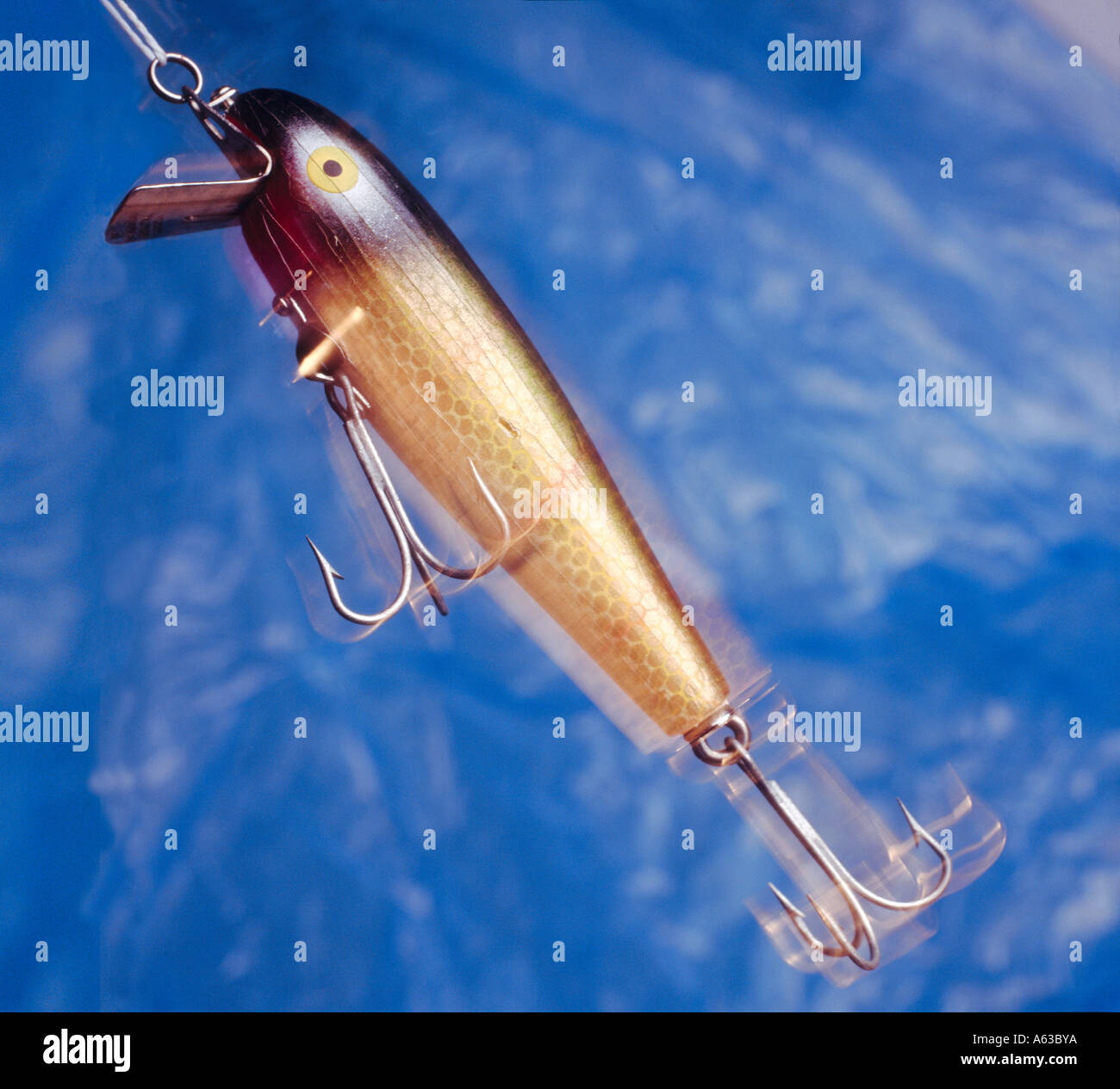 Shiny fishing hook hanging on the fishing line. Isolated 3d