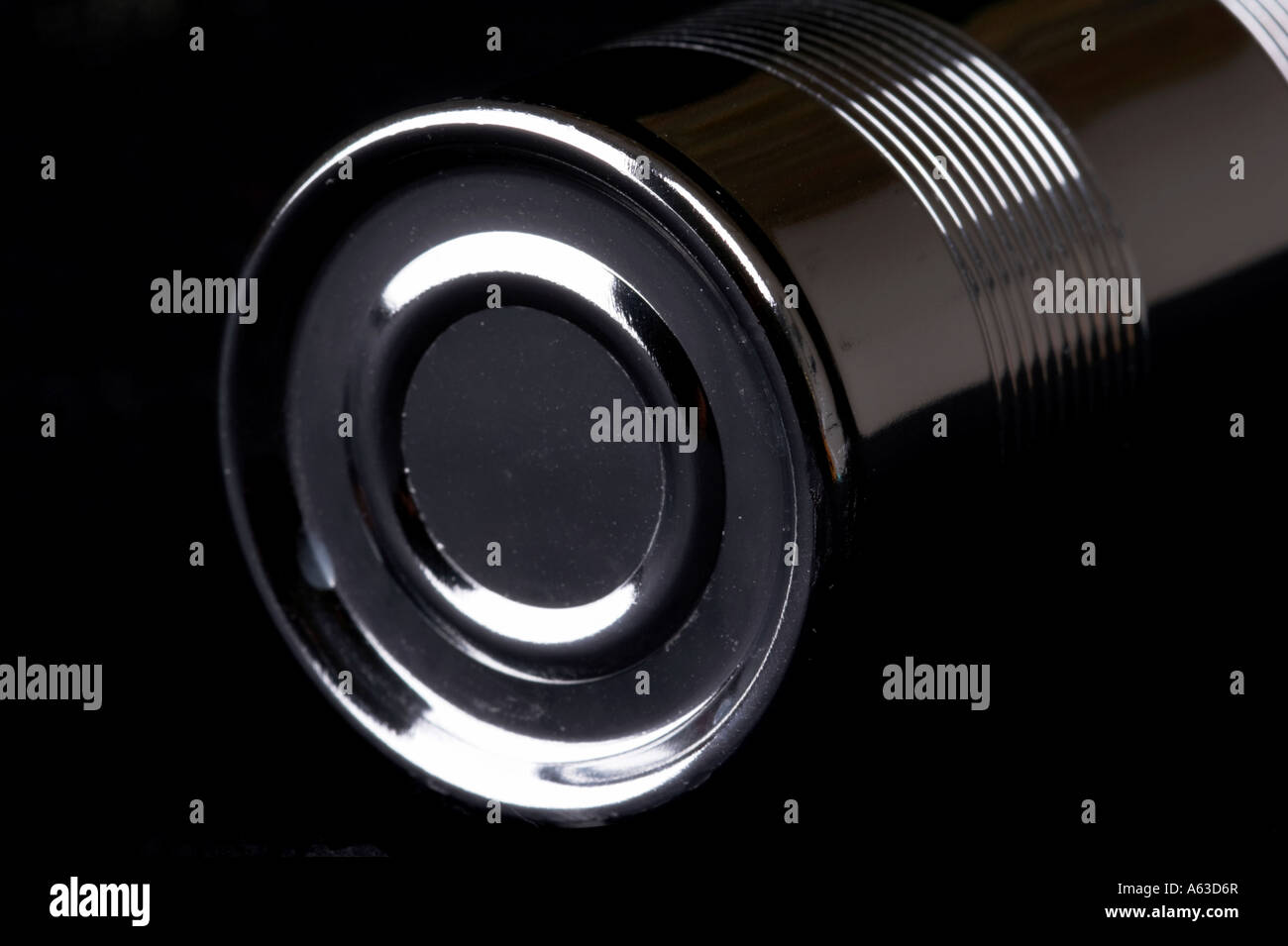 Silver can on black background Stock Photo - Alamy