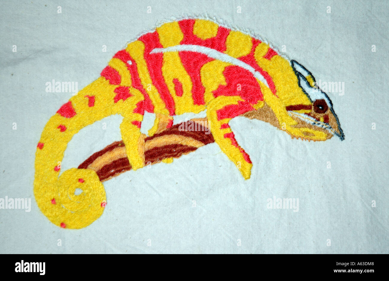 Hand embroidered chameleon Stock Photo