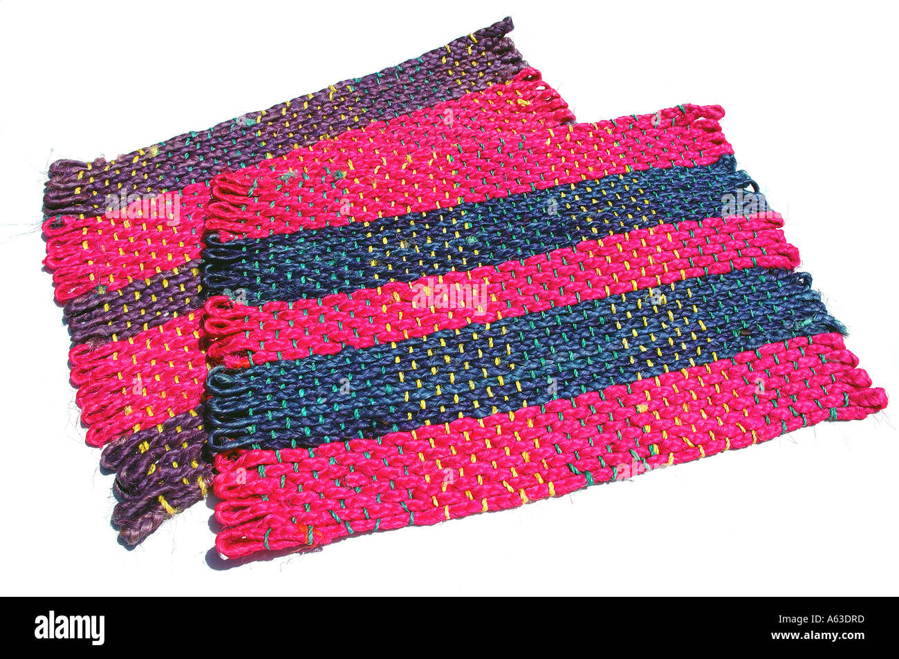 Colourful handmade rattan mats from Madagascar Stock Photo