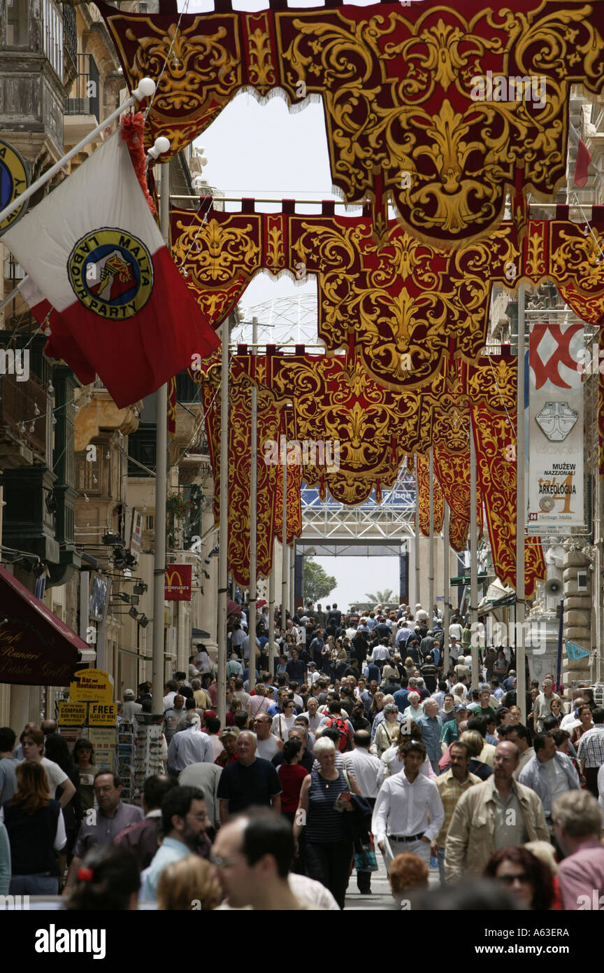 Tourists in street, Valletta, Malta Stock Photo