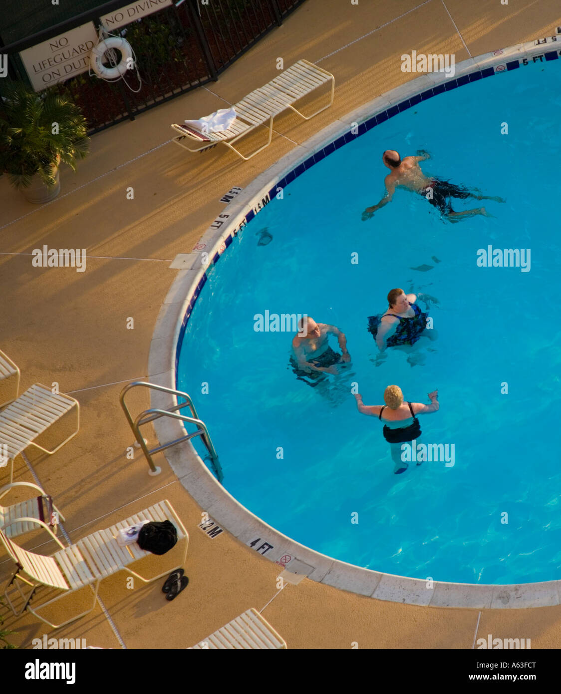 People in a swimming pool Stock Photo