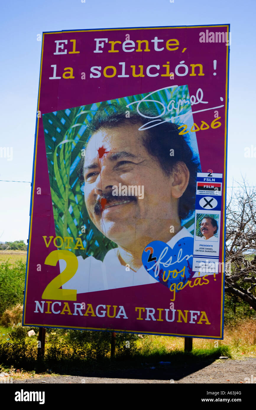 Defaced billboard of Daniel Ortega San Isidro Panamerican highway Nicaragua Stock Photo