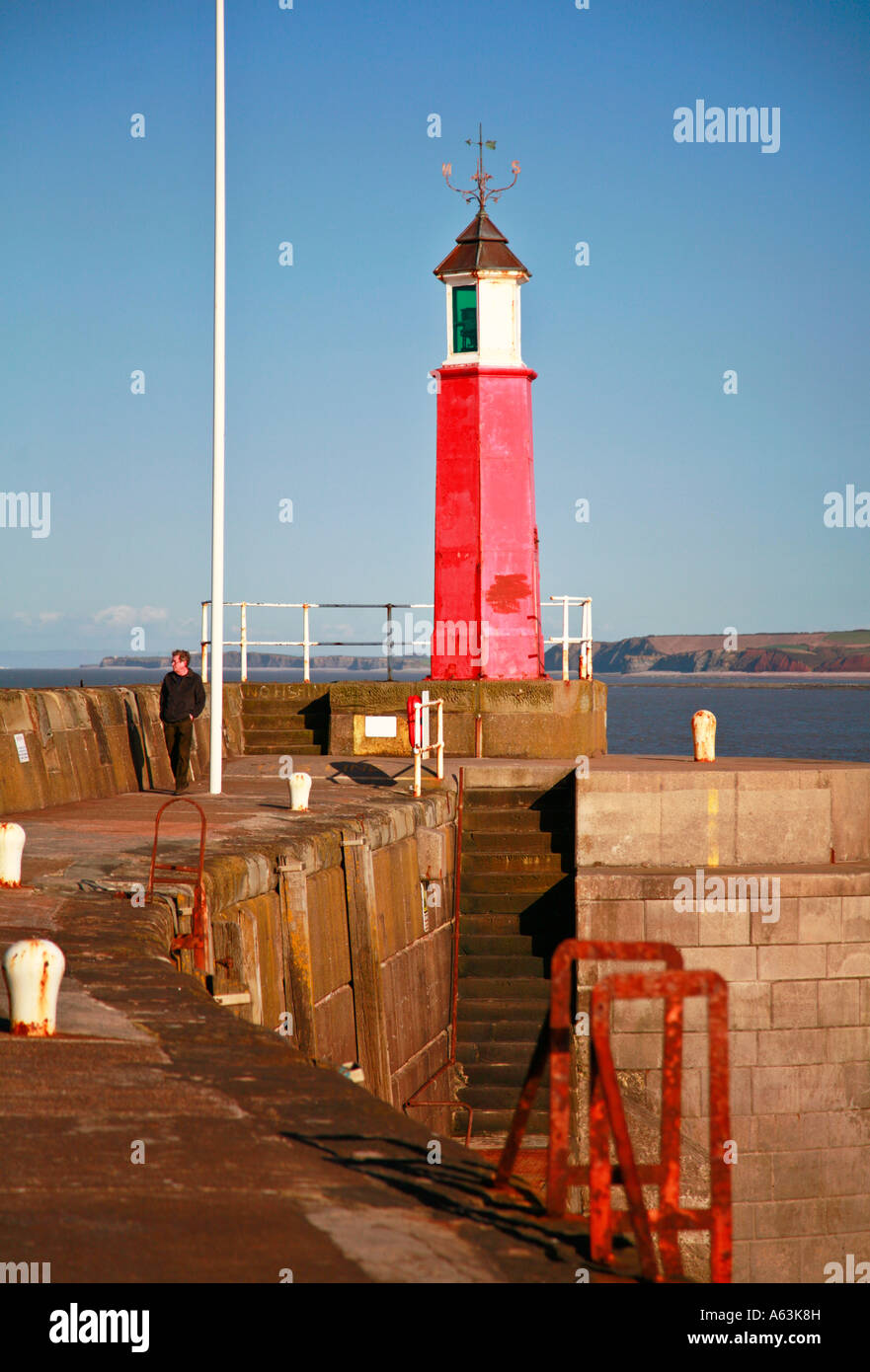 Lighthouse at the entrance to Watchet harbour Stock Photo