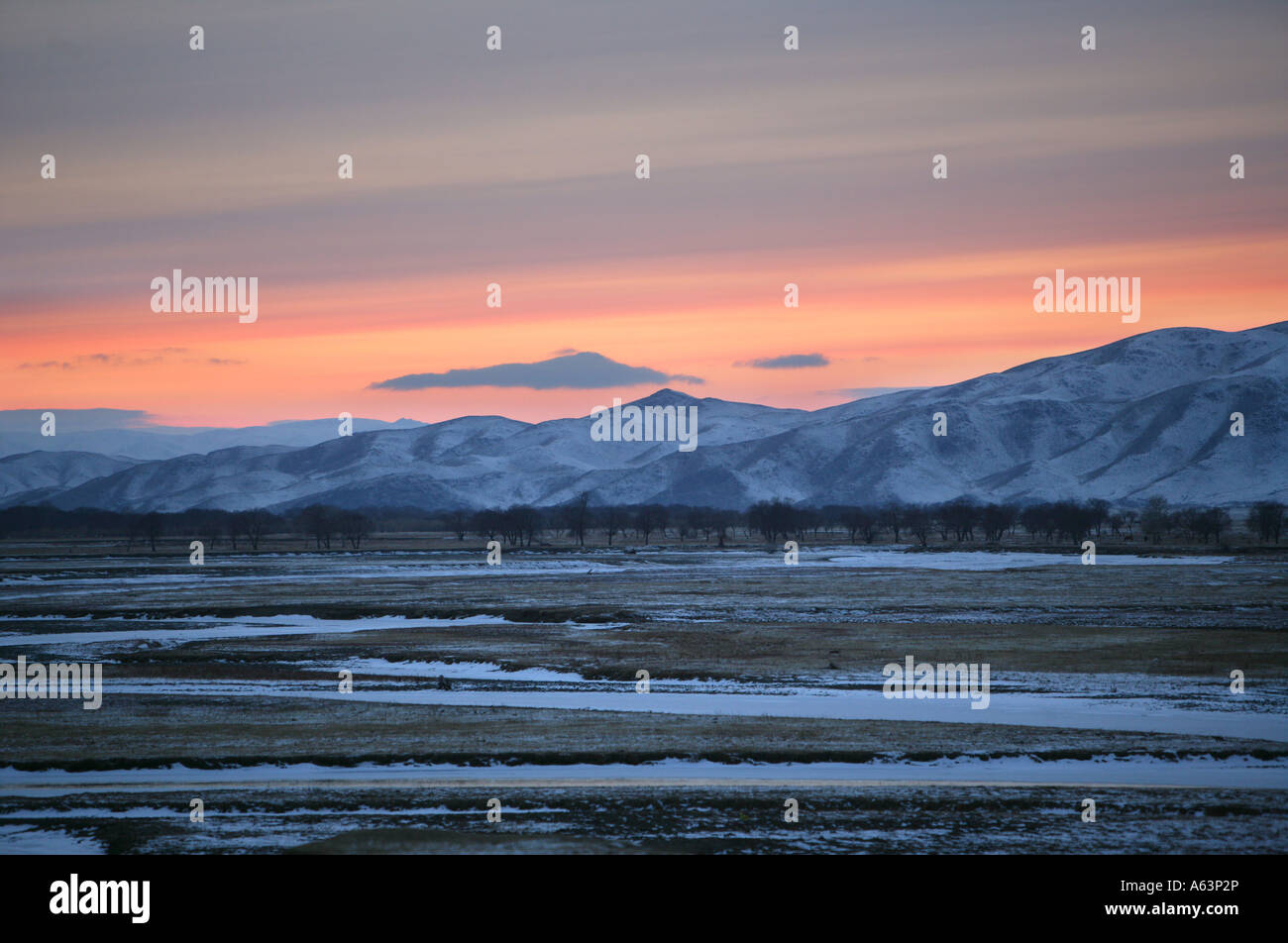 Mongolia - Evening mood over frozen river Stock Photo