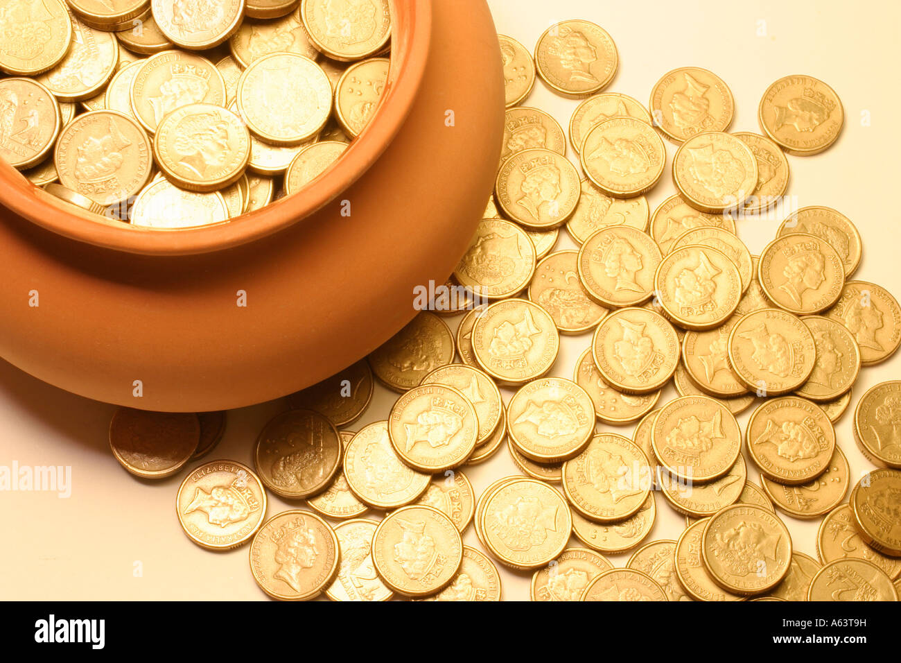 Clay Pot with Coins Stock Photo Alamy