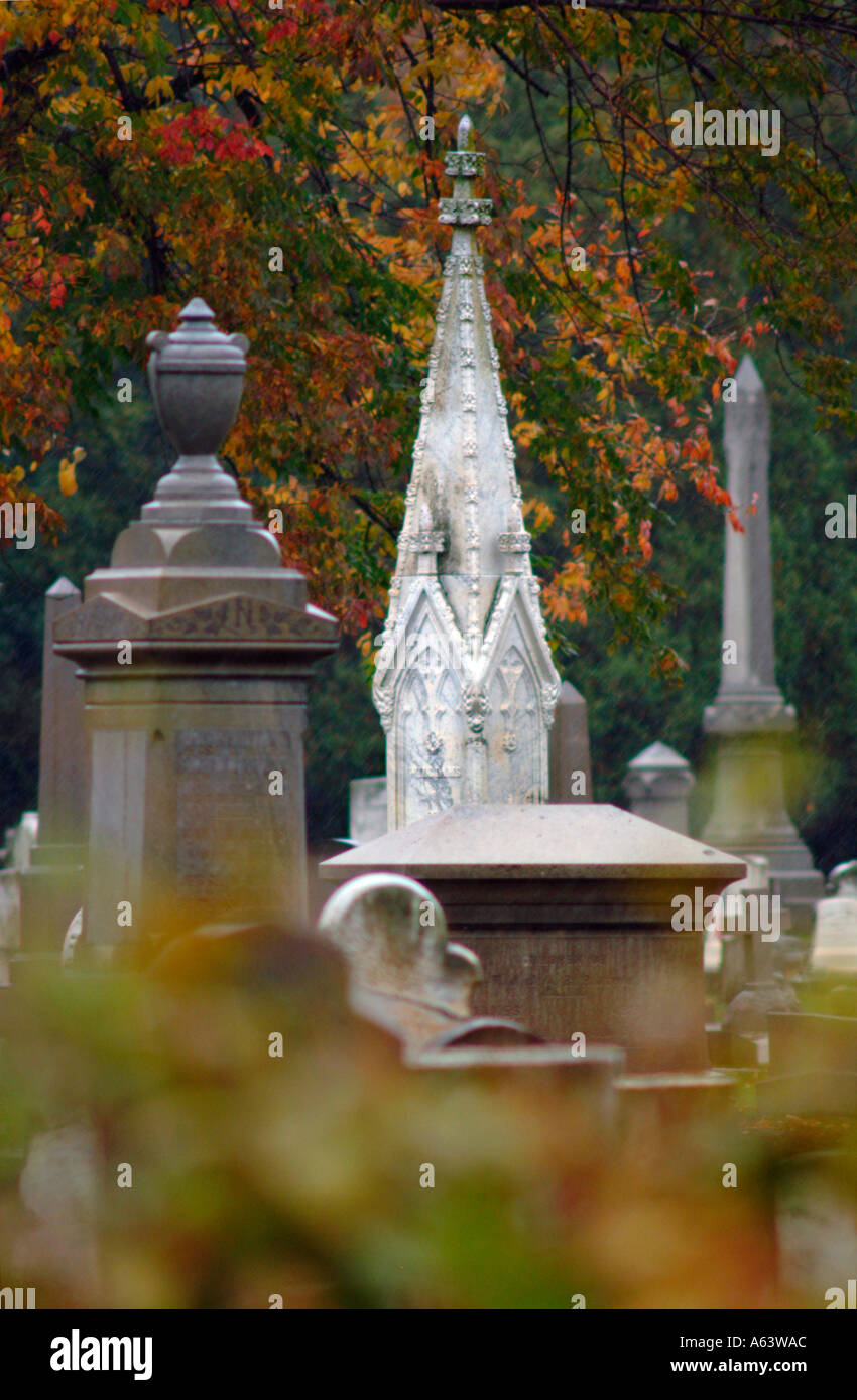 cemetery Norwichtown Connecticut graveyard old stones markers gravestones monuments dead death statues Stock Photo