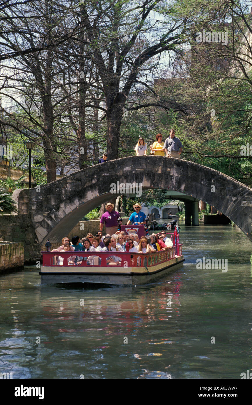 Taxi San Antonio >> Water Taxi Or Tour Boat On San Antonio River Passes Under Bridge On Taxi San Antonio >> Water Taxi Or Tour Boat On San Antonio River Passes Under Bridge On