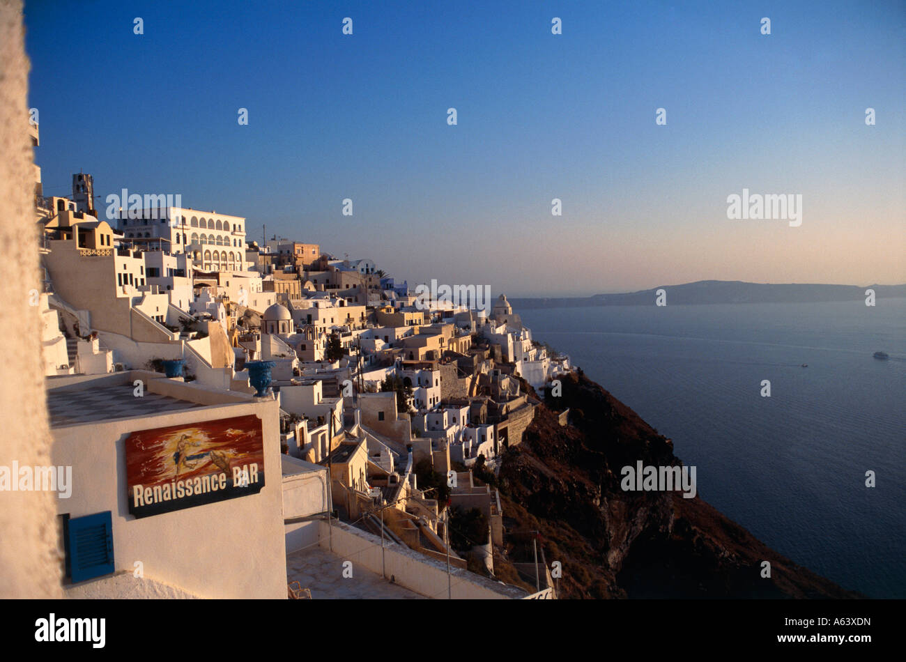 village of thira at evening island of santorin islands of cyclades greece editorial use only Stock Photo
