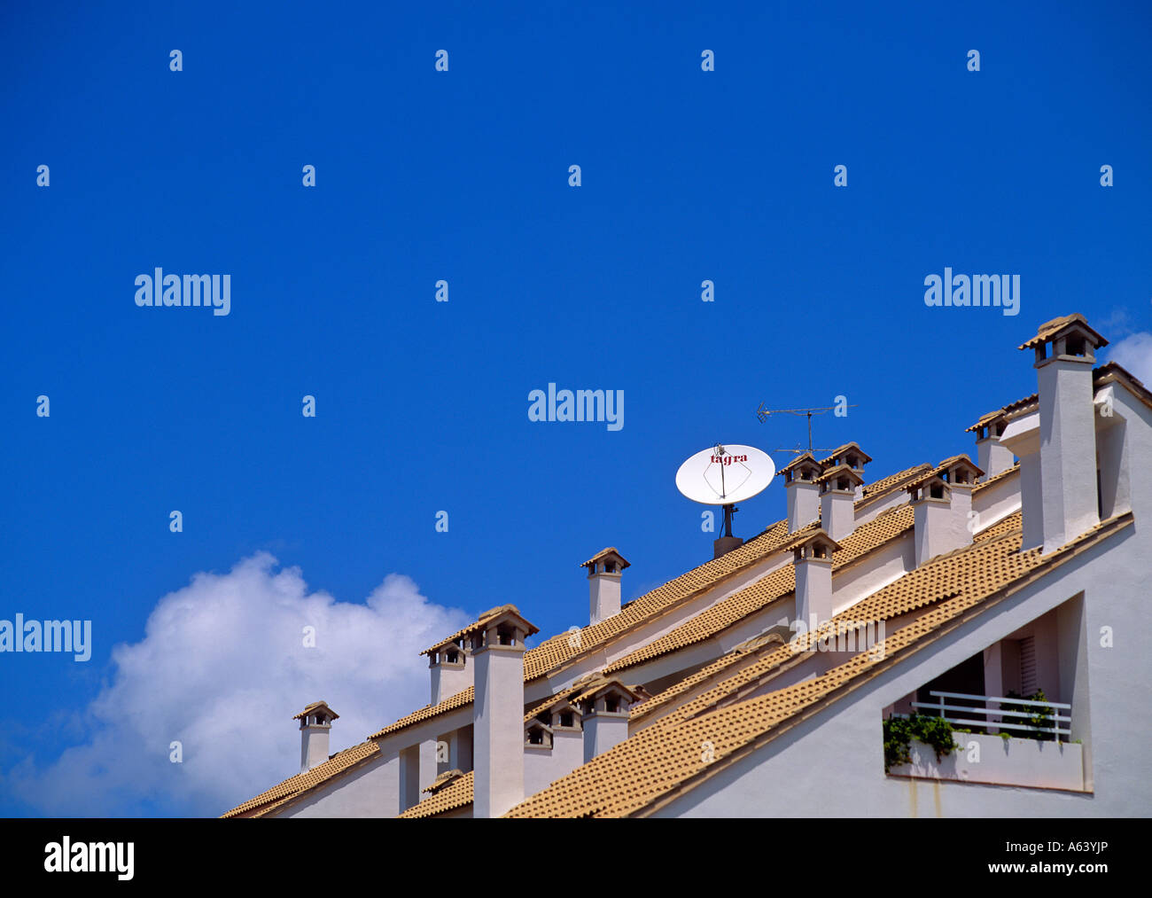 satellite dish on roof spain Stock Photo