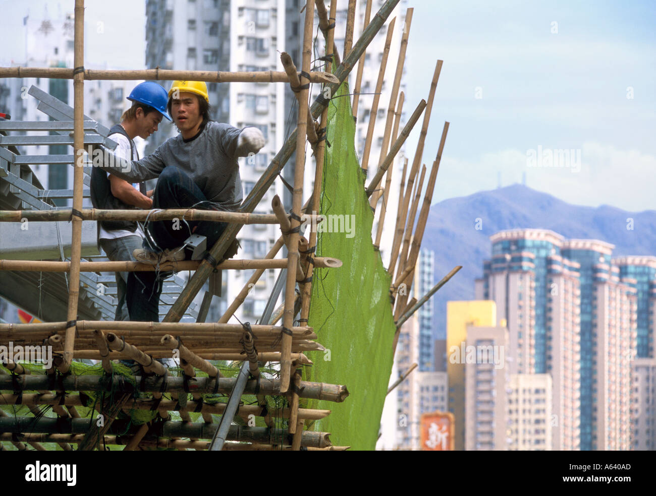 Workers on scaffolding Hong Kong 5 Stock Photo