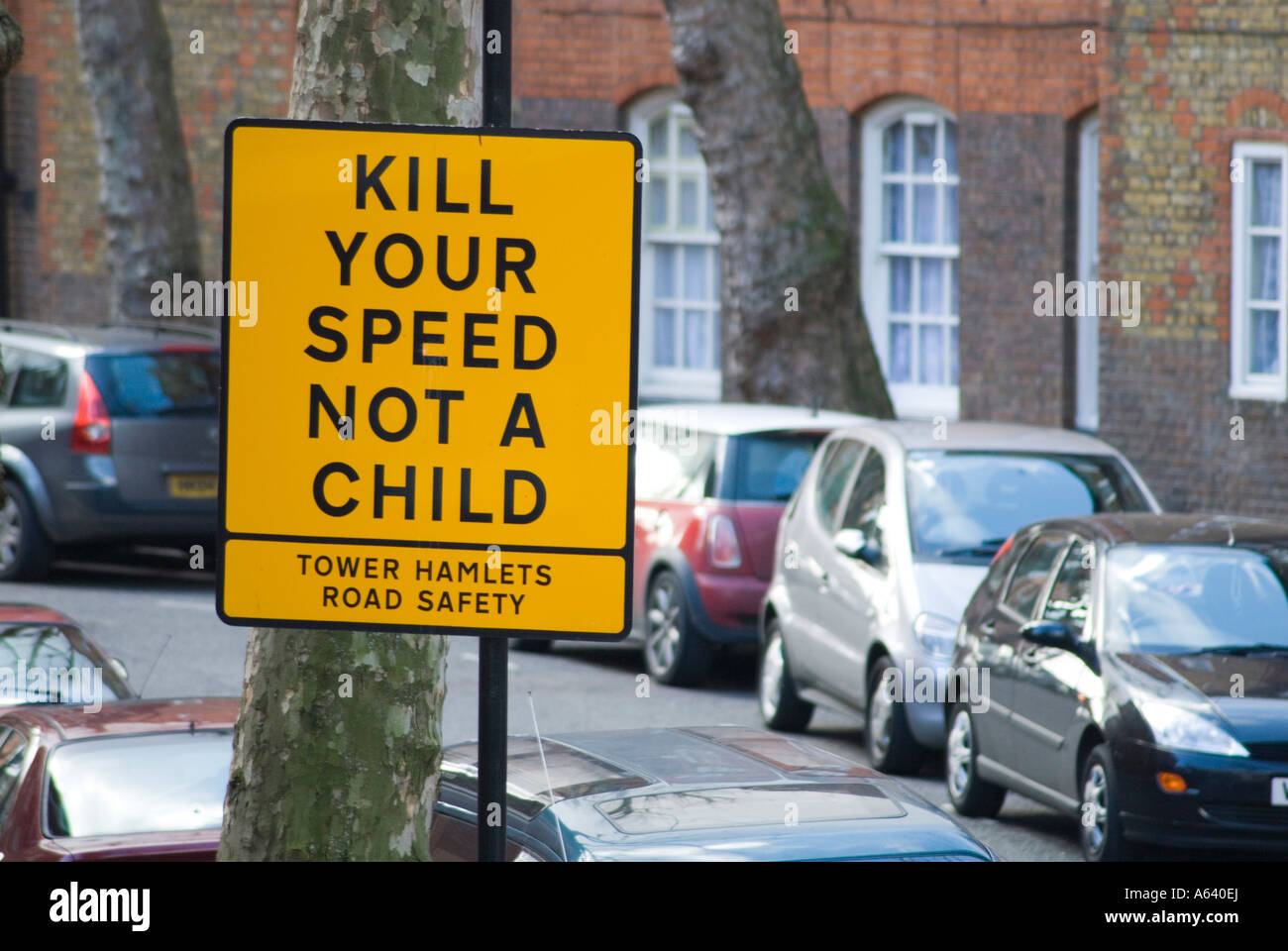 KILL YOUR SPEED NOT A CHILD road safety sign urging motorists to drive slowly in residential area, London England UK Stock Photo