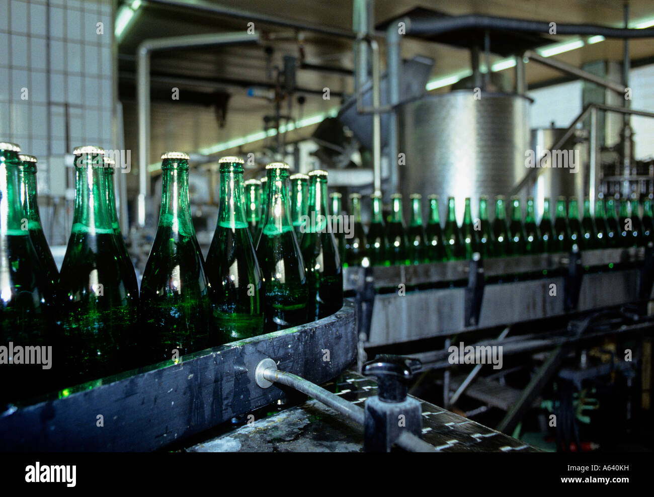crown capped cider bottling plant Stock Photo Alamy