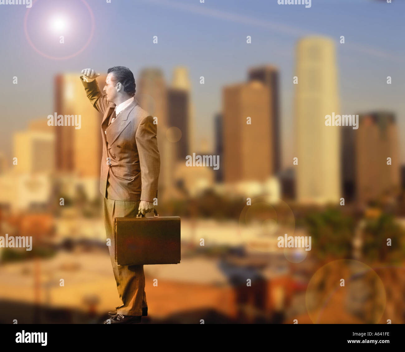 Businessman with cityscape background Stock Photo