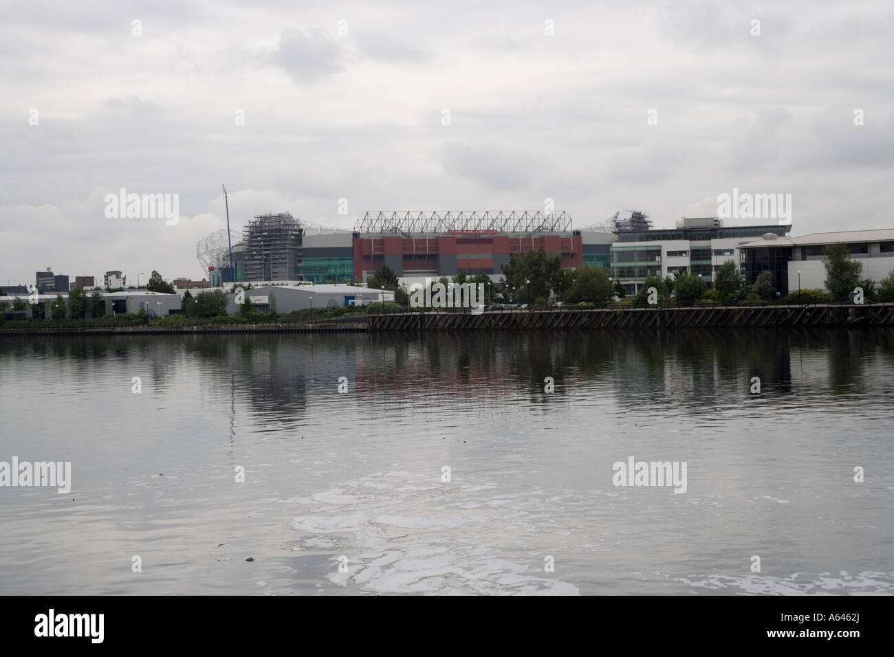 Manchester United football stadium from Salford Quays, England Stock ...