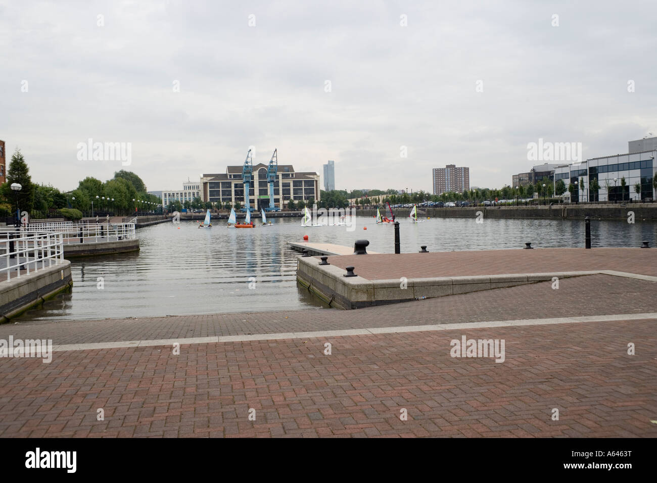 Wind surfing at Salford Quays with the Bentham tower in the distance,Salford ,Manchester,England