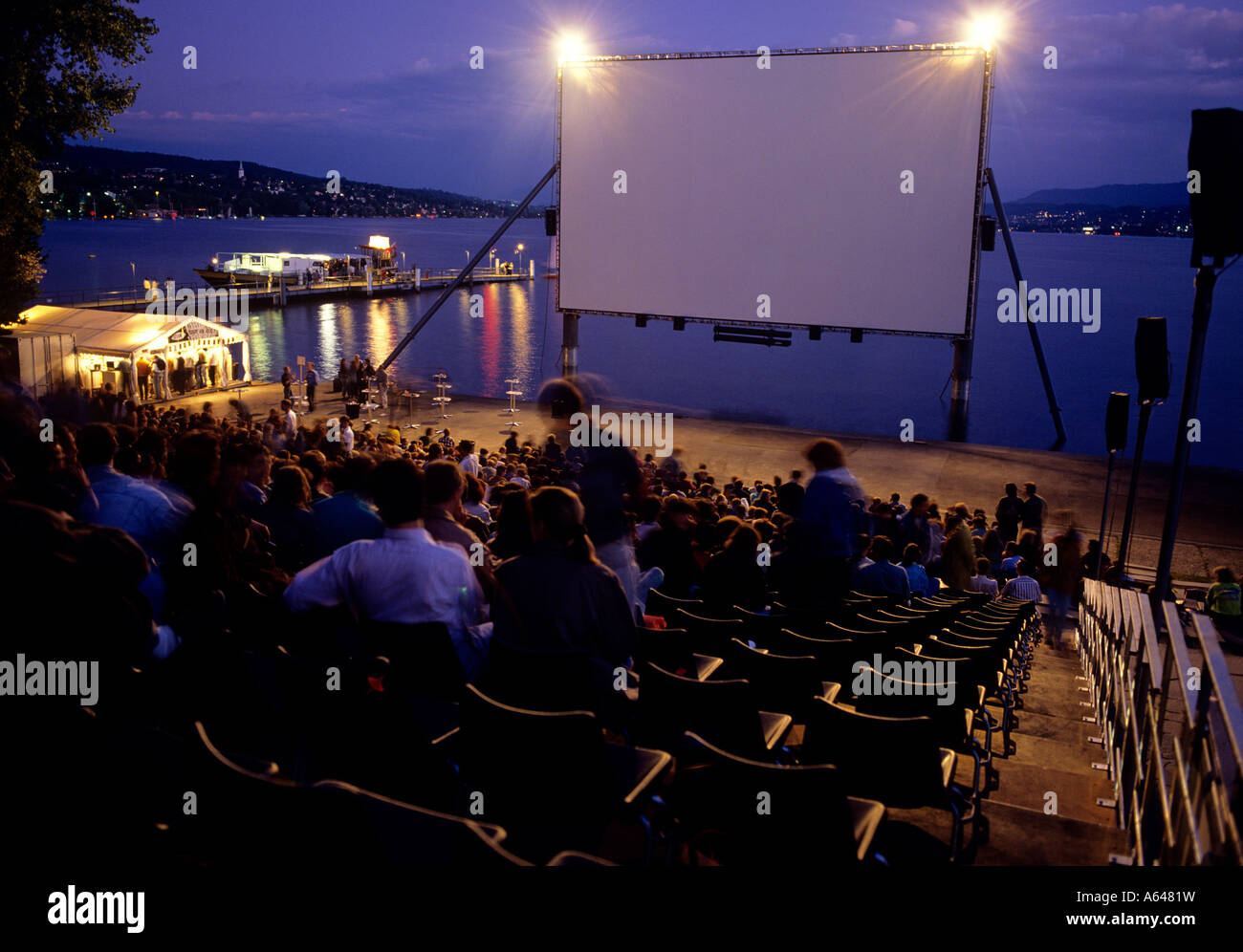 open air movie theatre at waterfront of lake zurich at evening city of