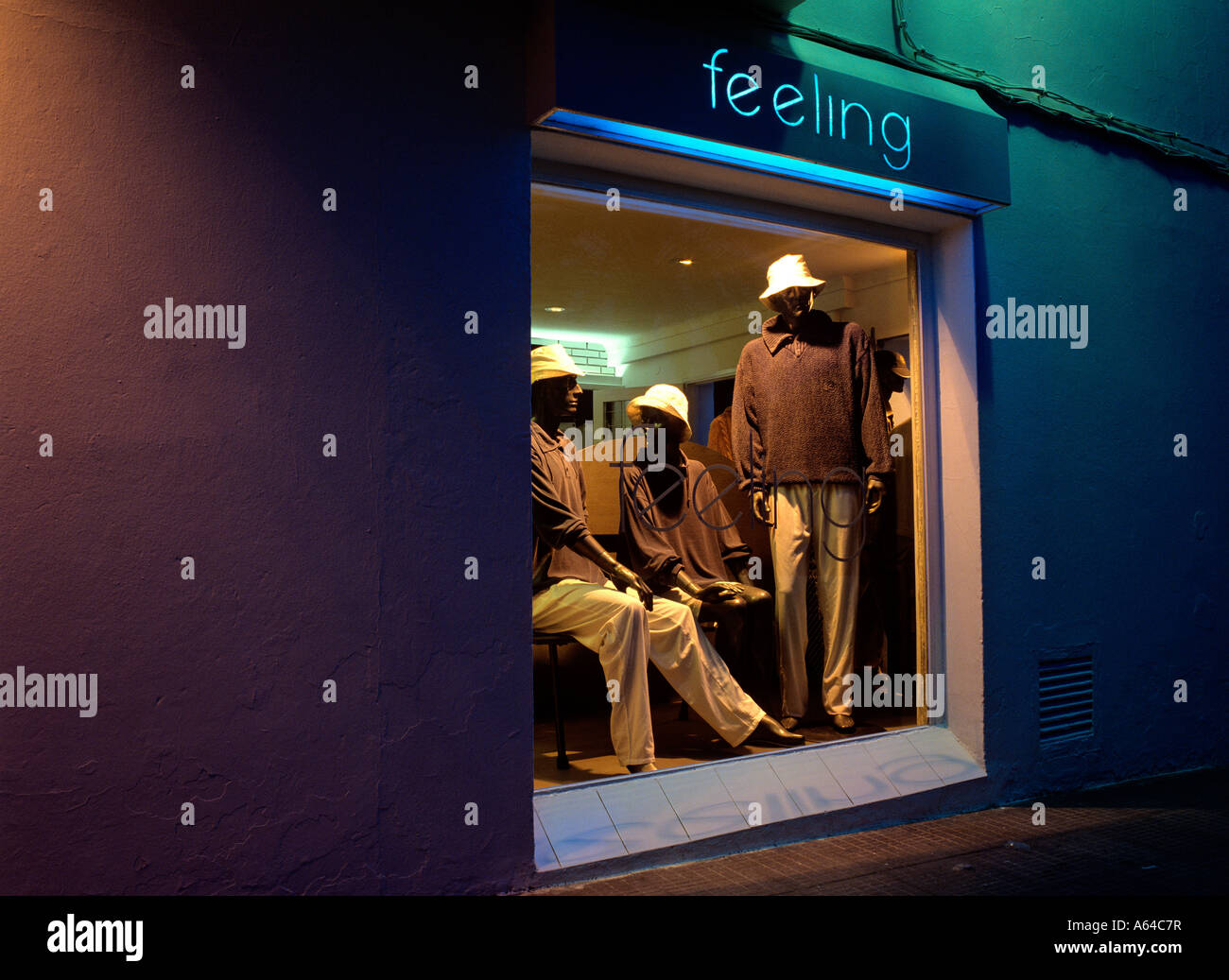 mannequin dummies in window of boutique feeling at evening town of ibiza ciudad old town ibiza balearic islands spain editorial Stock Photo