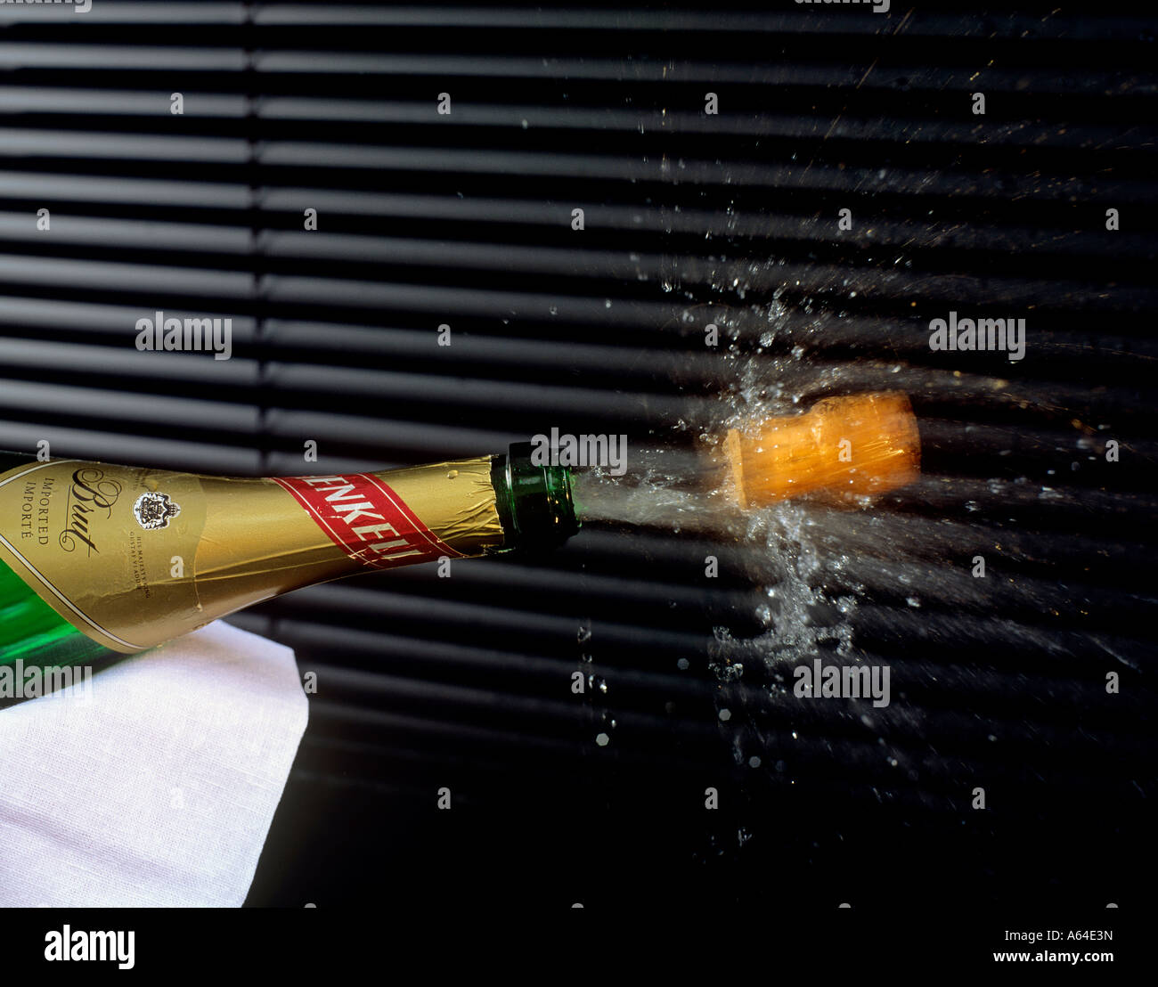 Cork popping out champagne bottle hires stock photography and images