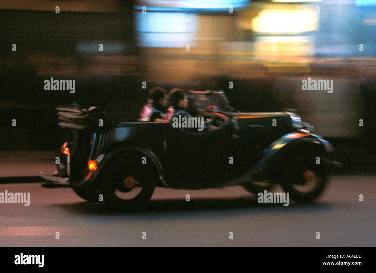 London Old open car at night in Piccadilly Circus 1962  Stock Photo