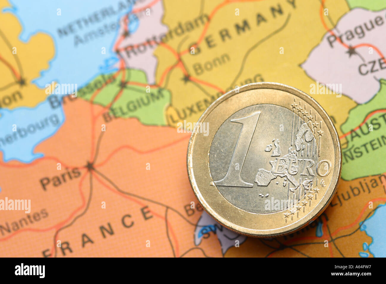 One Euro coin on map of Europe Stock Photo