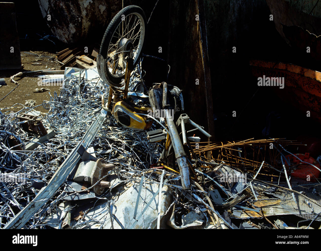 moped wreck and scrap at recycling scrap yard Stock Photo