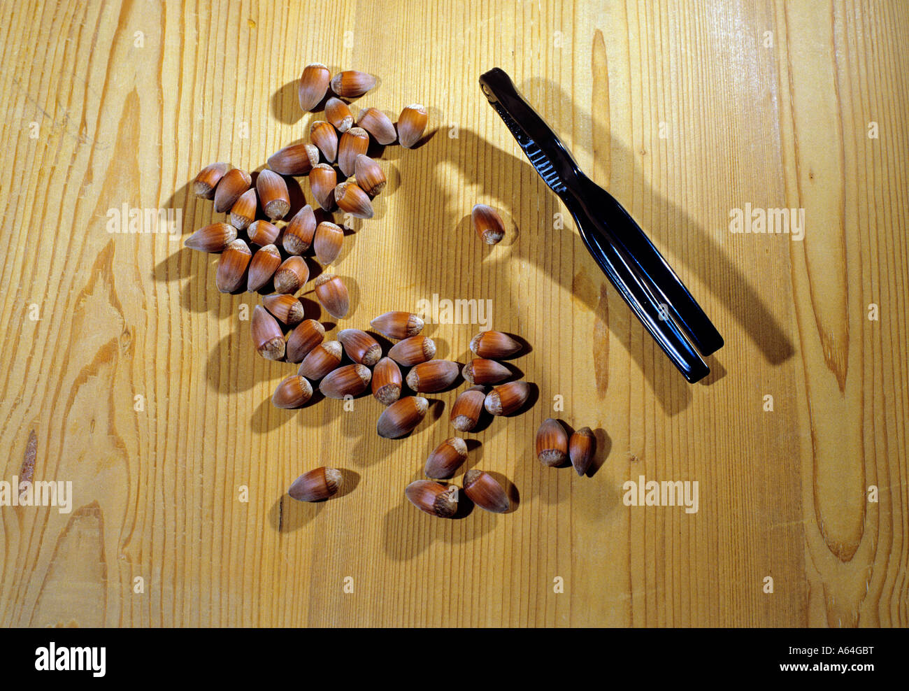 nutcracker and hazelnuts Stock Photo