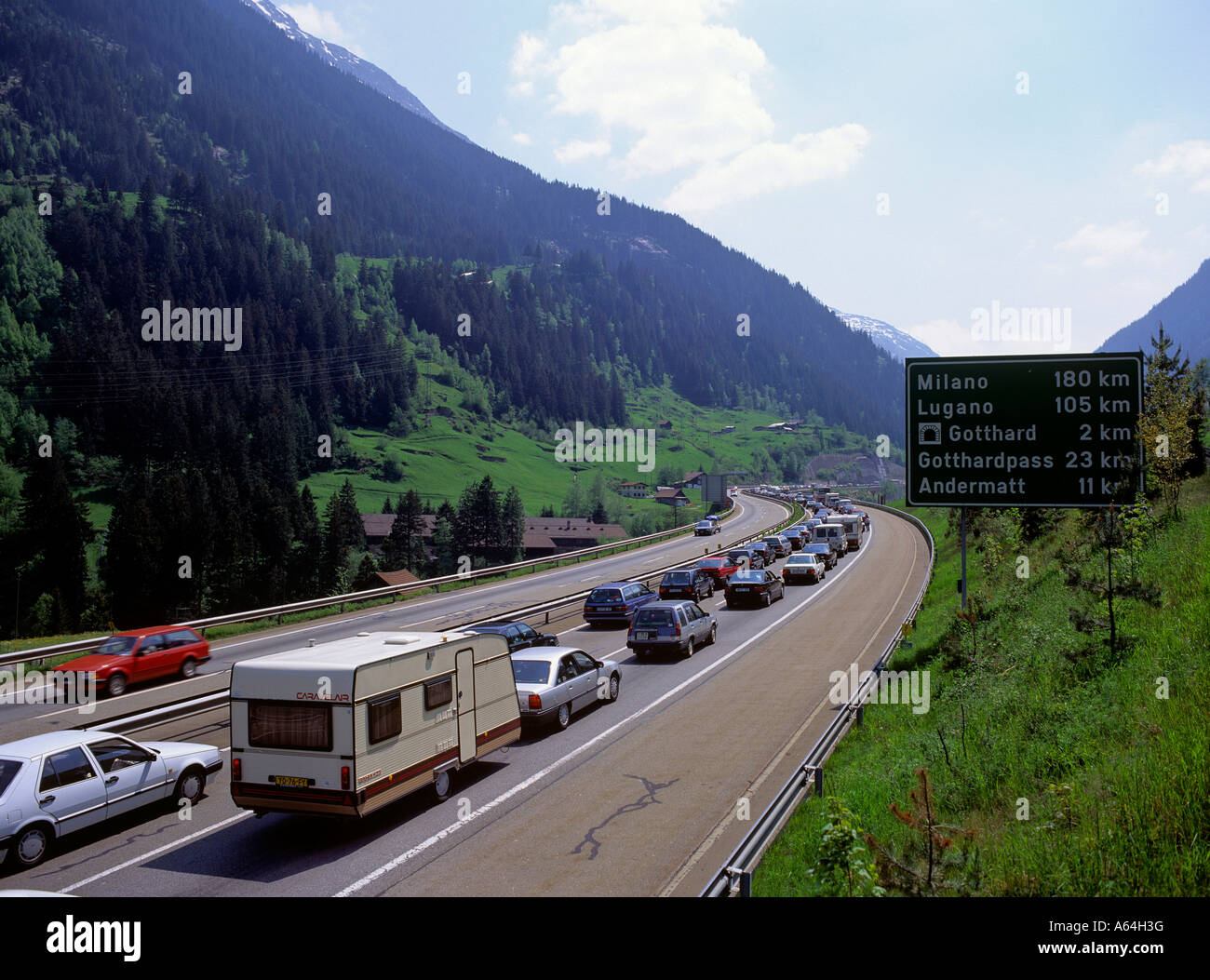 holiday traffic congestion jam on saint gotthard motorway near village of wassen swiss alpes canton of uri switzerland Stock Photo