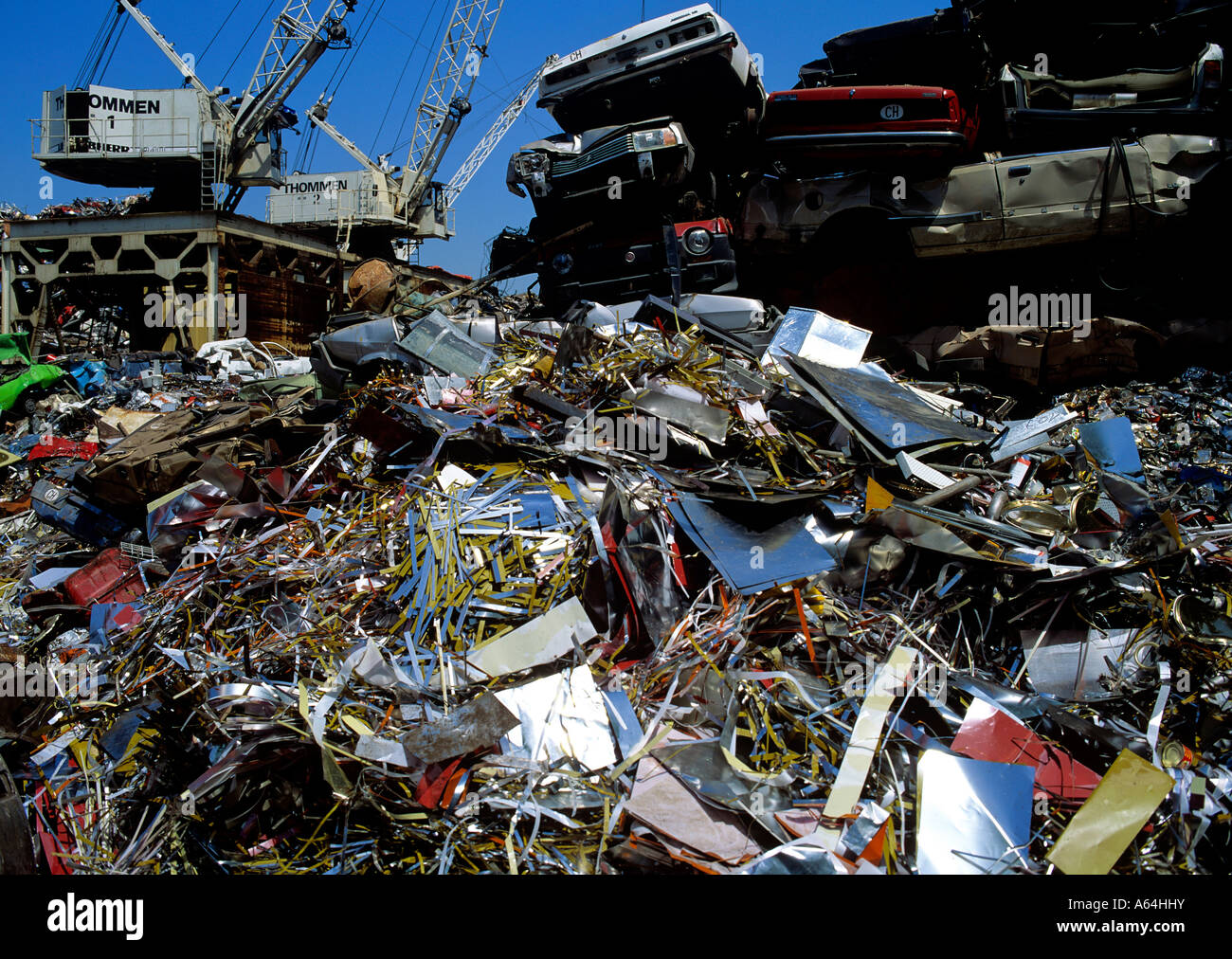 piled car wrecks and aluminum scrap at recycling scrap yard switzerland Stock Photo