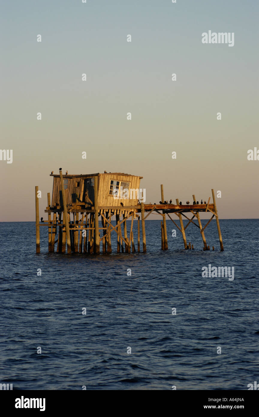 Cedar Key Florida old wood leaning stilt house famous landmark Stock Photo