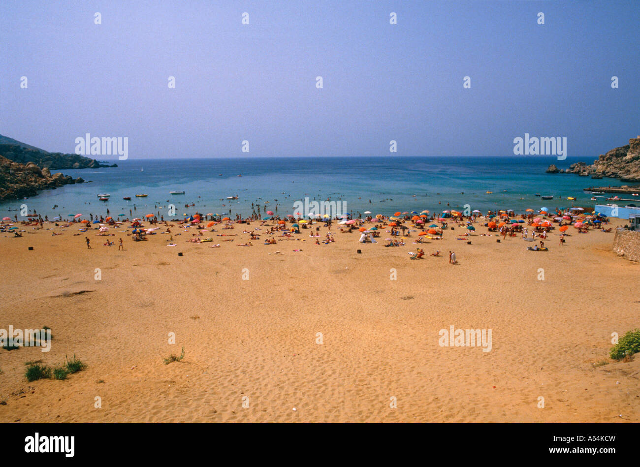 beach scene at golden bay malta Stock Photo - Alamy